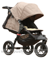 Baby Jogger City Elite Sand with seat reclined kicker raised plus Lambskin Stroller Fleece - click for larger image