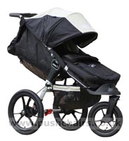 Baby Jogger Summit XC Black/Sand front wheel in swivel mode, with Black Baby Jogger Footmuff (best suited for a new born or younger baby) - click for larger image