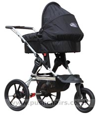 Baby Jogger Summit XC Black/Sand front wheel reverse locked, with Black Carrycot & Rain Cover fitted - click for larger image